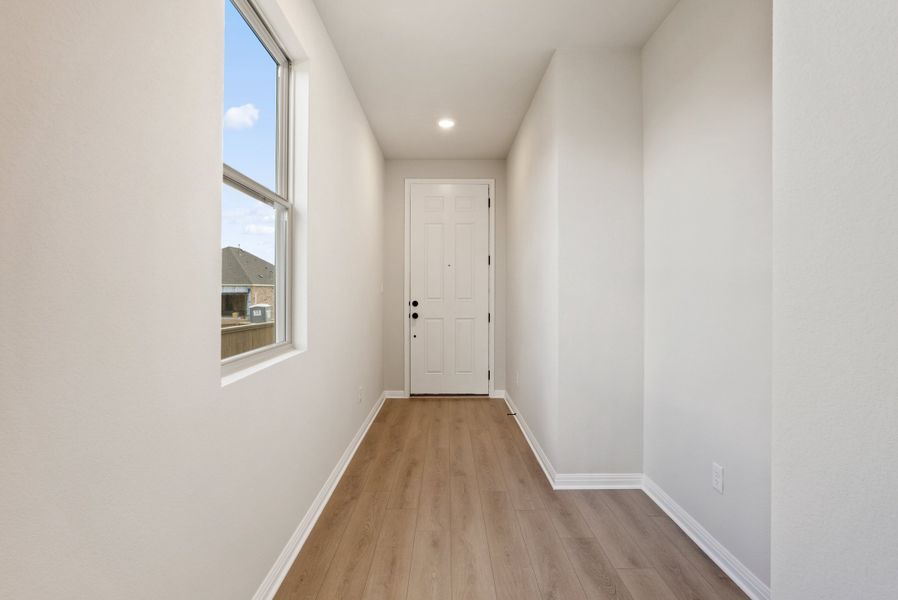 Representative unfurnished interior of a home built from the Texoma by Ashton Woods in The Colony 50s, Bastrop (Image 12).