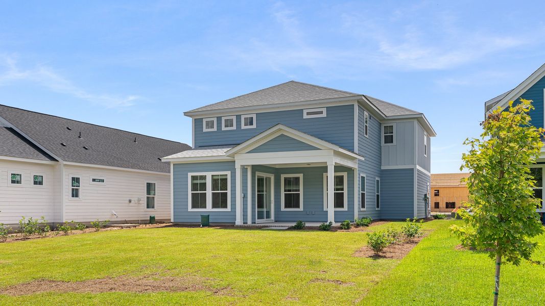 Representative exterior photo of a completed home built from the Tradd by DRB Homes in Midtown at Nexton, Summerville, SC (Image 14).