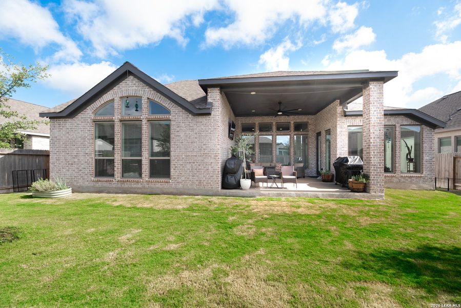 Exterior details and patio area of a home in Meadows of Mill Creek, Seguin (Image 27).