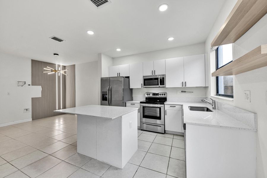 Furnished interior view inside a new home in , Homestead (Image 15). Furnished interior view inside a new home in , Homestead (Image 15).