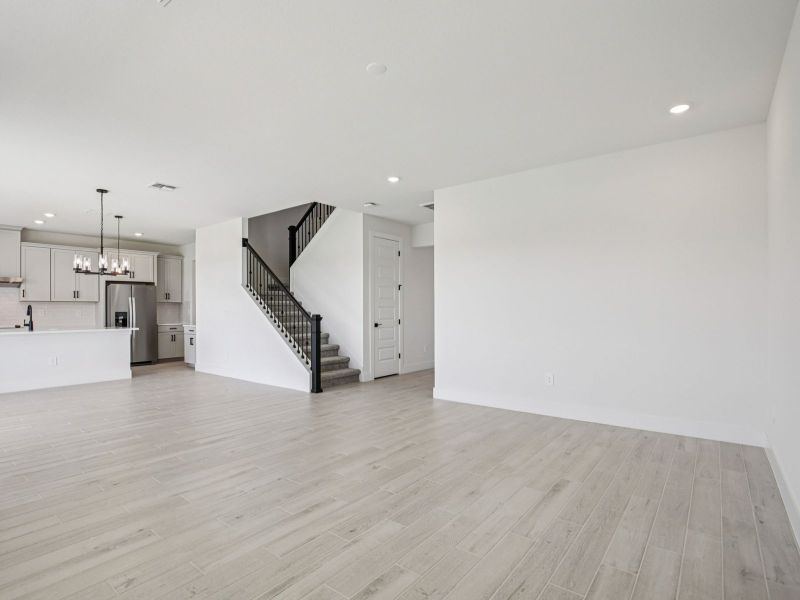 Spacious, unfurnished interior of a new home in Magnolia Bay - Reserve Series, Nokomis (Image 9).