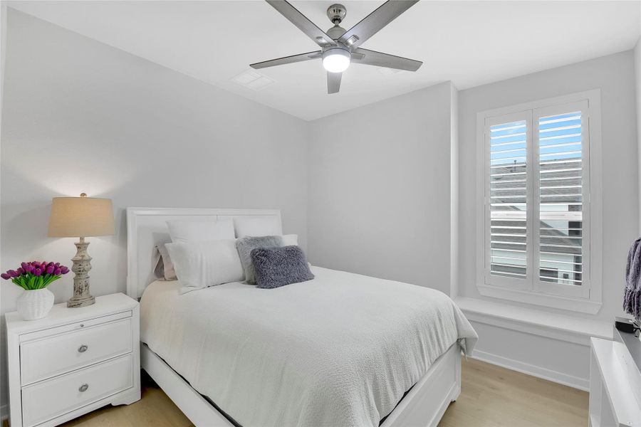 Second upstairs bedroom. Plantation shutters on all windows.