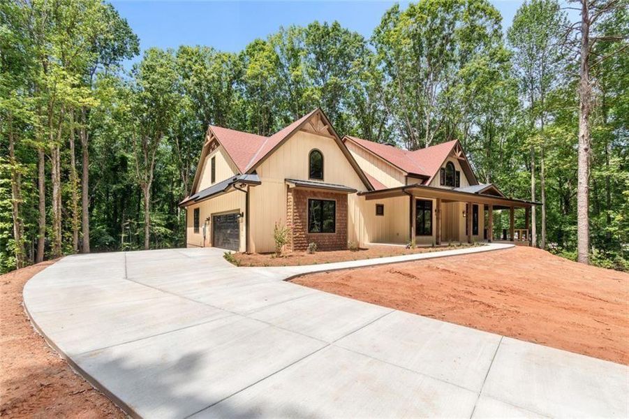 Front exterior of a new home in , Dawsonville, GA, highlighting curb appeal (Image 28). Front exterior of a new home in , Dawsonville, GA, highlighting curb appeal (Image 28).