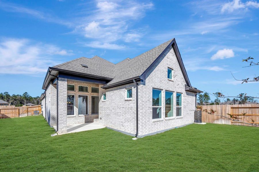Exterior details and patio area of a home in ARTAVIA 45' Homesites, Conroe (Image 4).