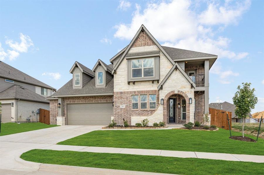 Front exterior of a new home in Hampton Park, Glenn Heights, TX, highlighting curb appeal (Image 2). Front exterior of a new home in Hampton Park, Glenn Heights, TX, highlighting curb appeal (Image 2).