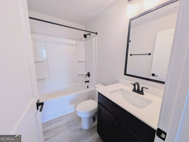 Furnished interior view inside a new home in Canterbury Villas, Carrollton (Image 13).