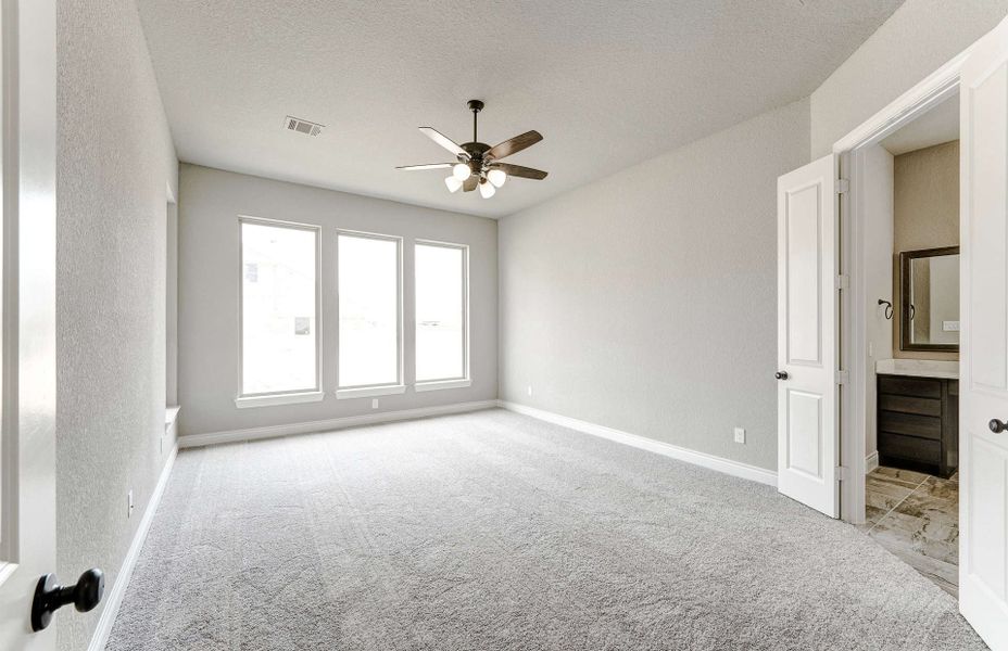 Representative unfurnished interior of a home built from the 3799 by Ravenna Homes in Artavia 70′, Conroe (Image 45).