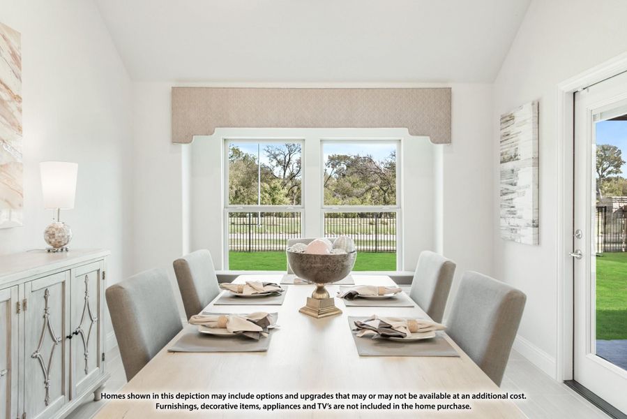 Dining room with light wood table, gray chairs, and large window overlooking a green backyard Dining room with light wood table, gray chairs, and large window overlooking a green backyard