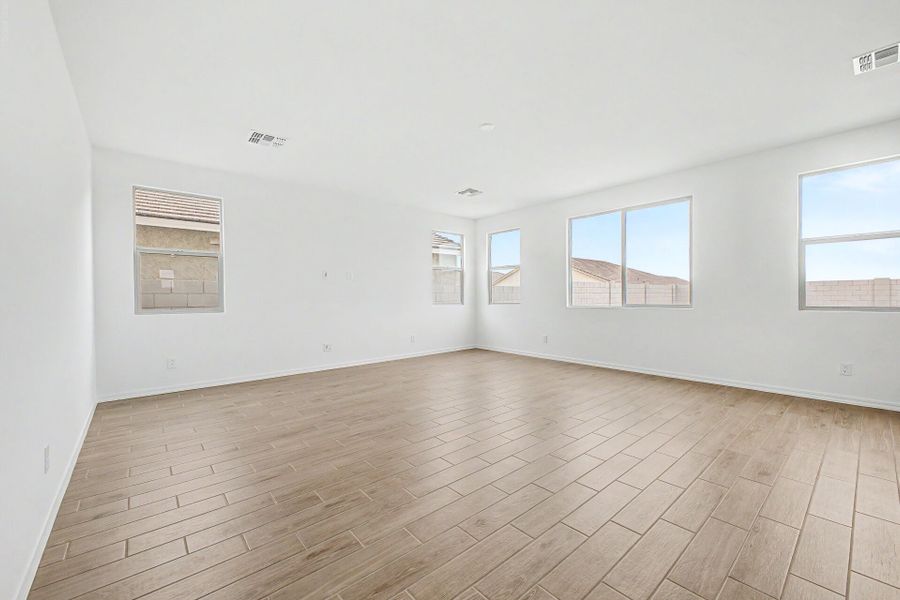 Spacious, unfurnished interior of a new home in White Tank Vistas, Waddell (Image 14).