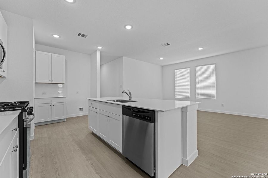 Furnished interior view inside a new home in Waterwheel: Coastline Collection, San Antonio (Image 11).