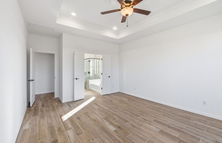 Spacious, unfurnished interior of a new home in Saddleback at Santa Rita Ranch, Liberty Hill (Image 32).