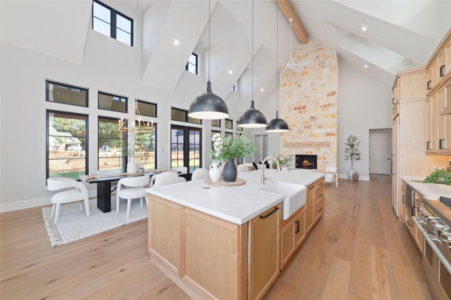 The kitchen overlooking the dining, and main living space.