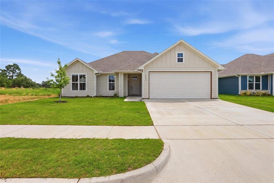 Front exterior of a new home in , Tolar, TX, highlighting curb appeal (Image 26).