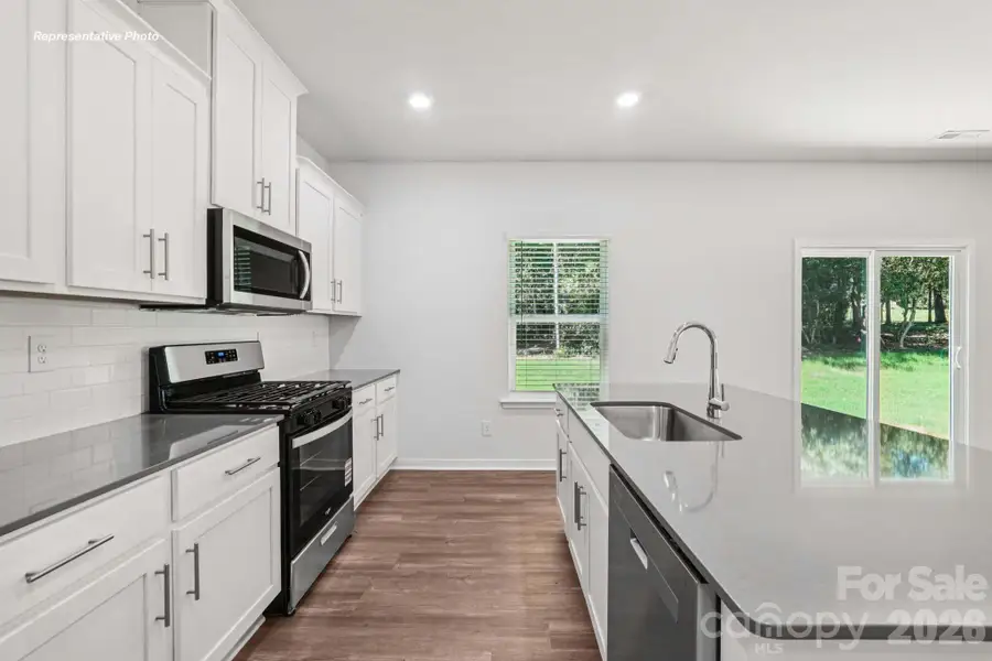 Furnished interior view inside a new home in Reedy Creek Preserve, Charlotte (Image 9).