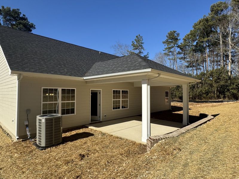 Exterior details and patio area of a home in Crystal Village, Albemarle (Image 3).