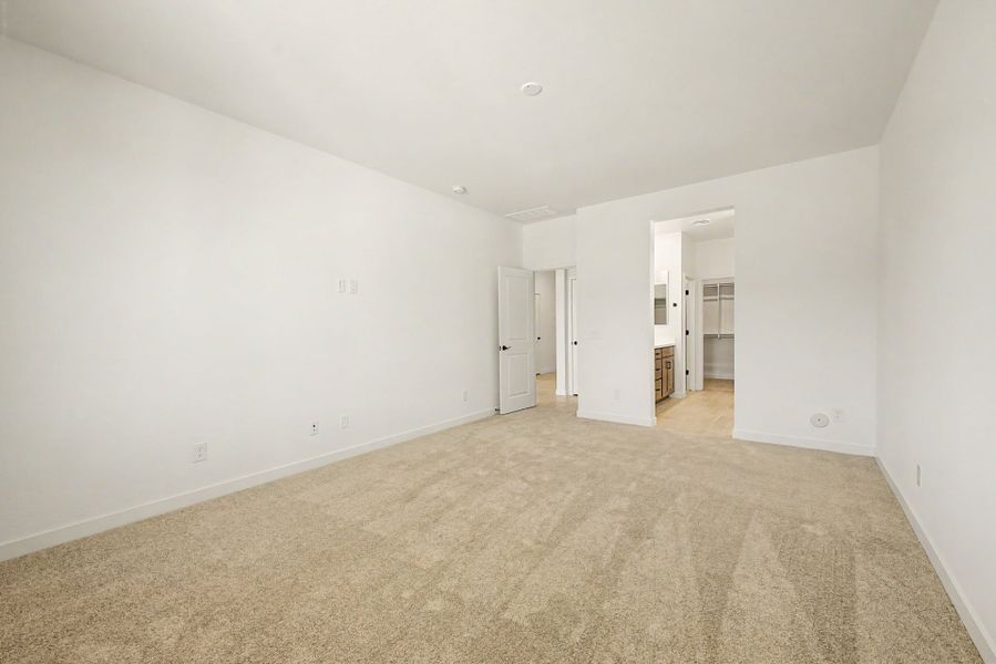 Spacious, unfurnished interior of a new home in The Villages at North Copper Canyon, Surprise (Image 9).
