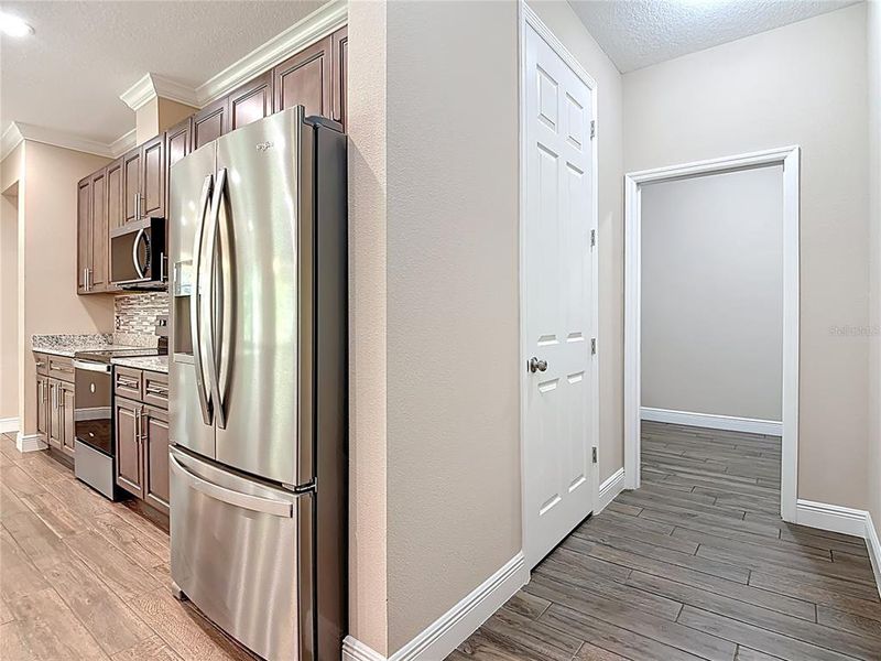 Kitchen, and Mud Room into Laundry Room Kitchen, and Mud Room into Laundry Room