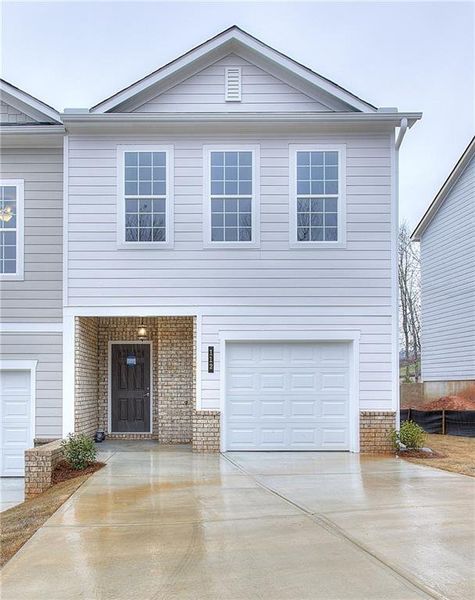 Front exterior of a new home in , Homer, GA, highlighting curb appeal (Image 1). Front exterior of a new home in , Homer, GA, highlighting curb appeal (Image 1).