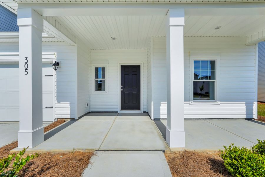 Exterior details and patio area of a home in Heritage at New Riverside, Bluffton (Image 3).