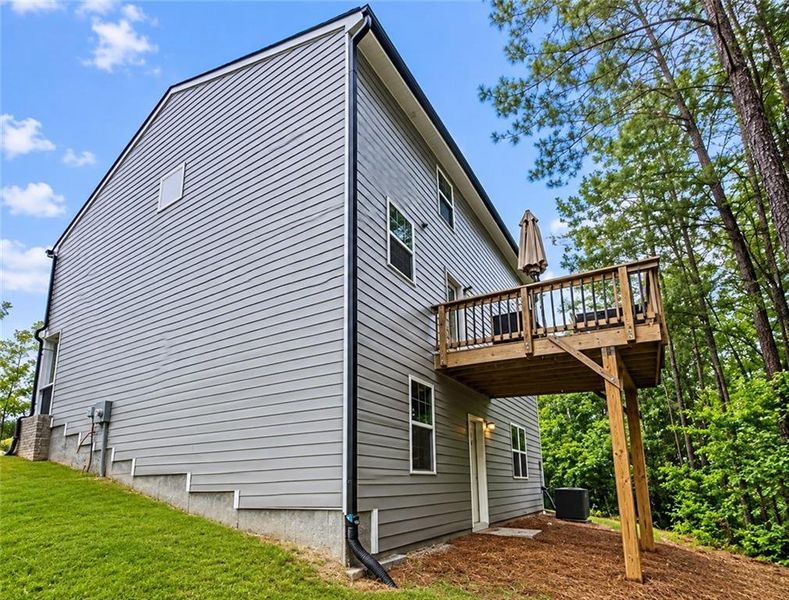 Exterior details and patio area of a home in The Villages at Oakshire, Atlanta (Image 4).