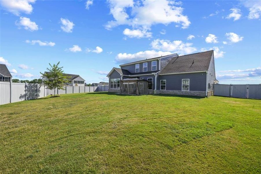 Front exterior of a new home in , Locust Grove, GA, highlighting curb appeal (Image 18).