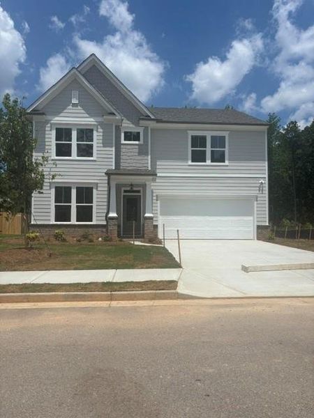 Front exterior of a new home in Edenglen, Buford, GA, highlighting curb appeal (Image 1). Front exterior of a new home in Edenglen, Buford, GA, highlighting curb appeal (Image 1).