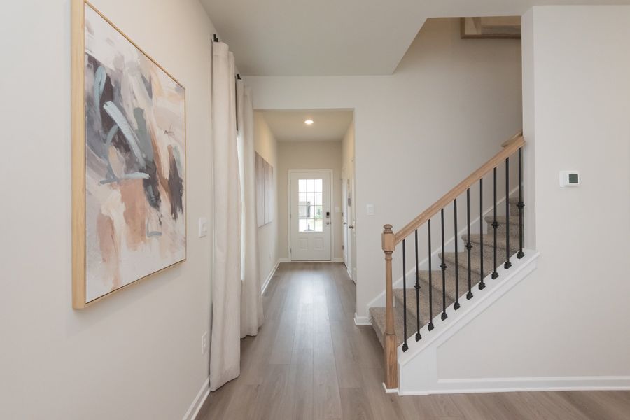 Welcome family or guests through this entryway/foyer.