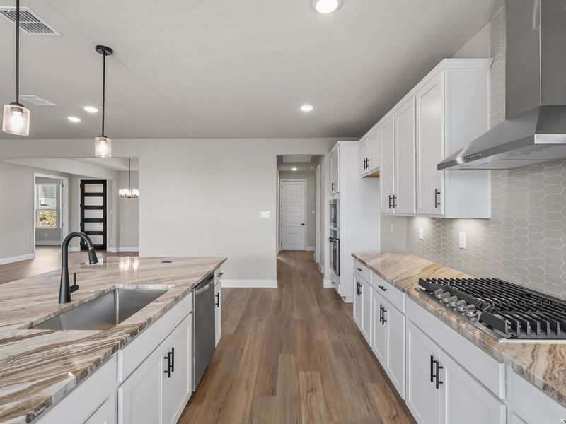 Furnished interior view inside a new home in Potranco Oaks, Castroville (Image 9).