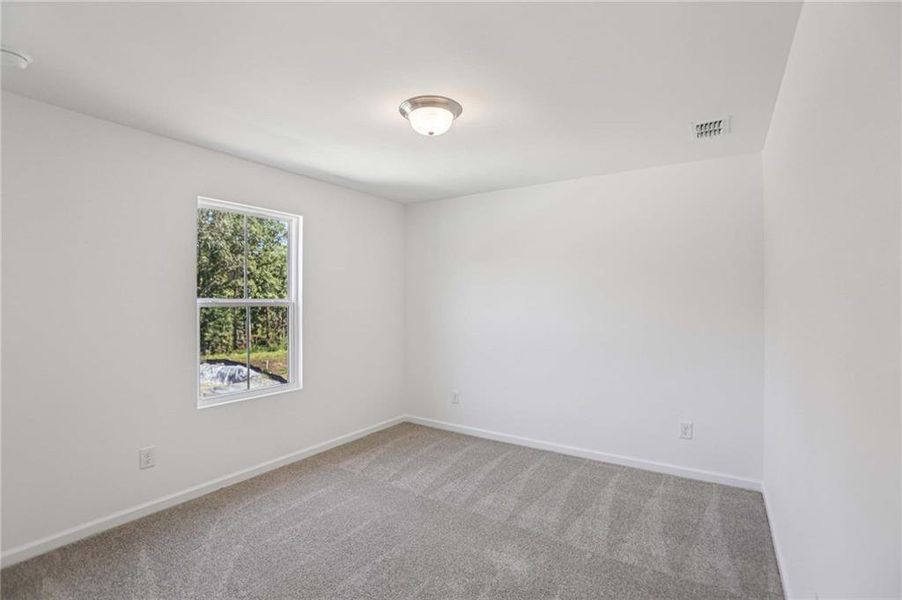Spacious, unfurnished interior of a new home in The Pointe at Heron Bay, Locust Grove (Image 34).