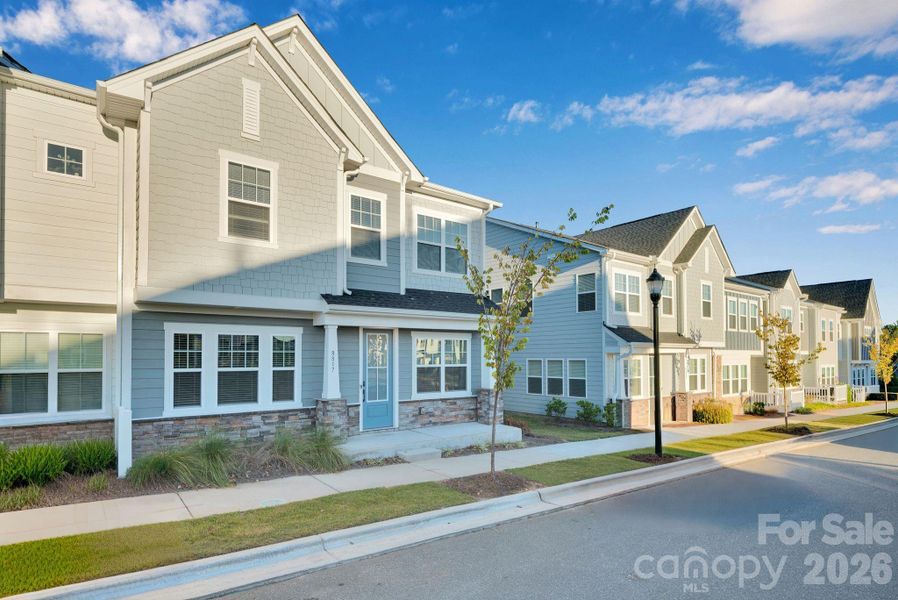 Front exterior of a new home in Trellis at The Commons, Charlotte, NC, highlighting curb appeal (Image 20). Front exterior of a new home in Trellis at The Commons, Charlotte, NC, highlighting curb appeal (Image 20).