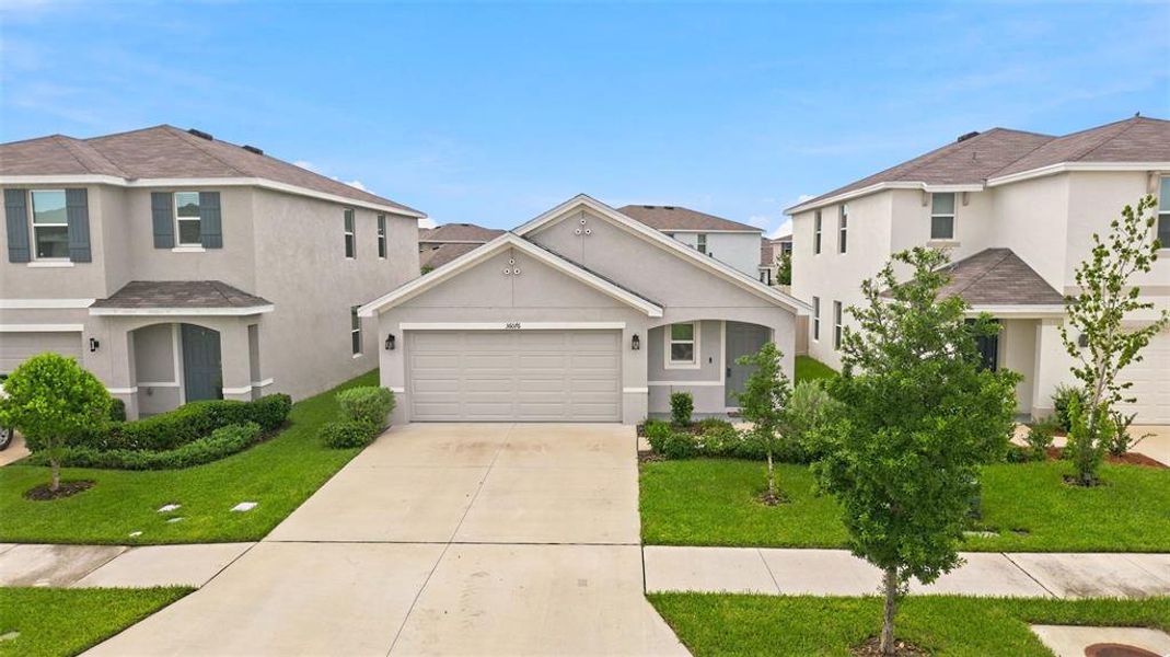 Front exterior of a new home in Northwater at Two Rivers, Zephyrhills, FL, highlighting curb appeal (Image 26).