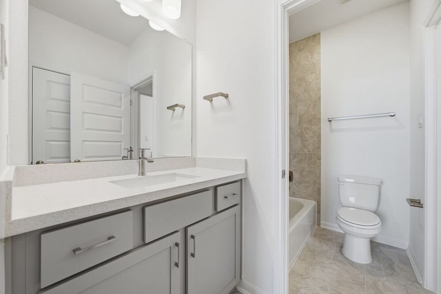 Furnished interior view inside a new home in Parkside on the River 60s, Georgetown (Image 13).