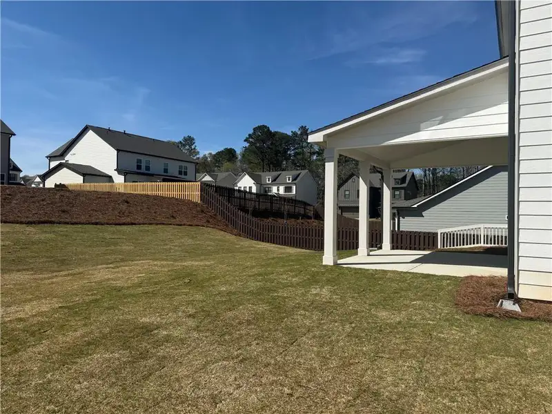Exterior details and patio area of a home in Rosewood Lake Estates, Hoschton (Image 3).