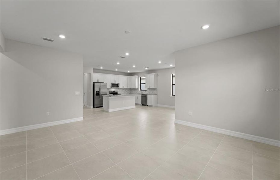 Spacious, unfurnished interior of a new home in Cedar Grove at The Woodlands, North Port (Image 13).