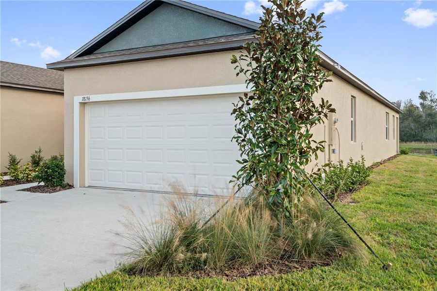 Exterior details and patio area of a home in Angeline, Land O' Lakes (Image 3).