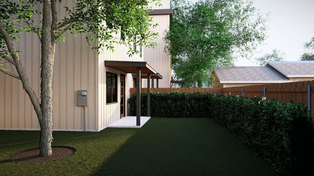 Fenced backyard with a patio