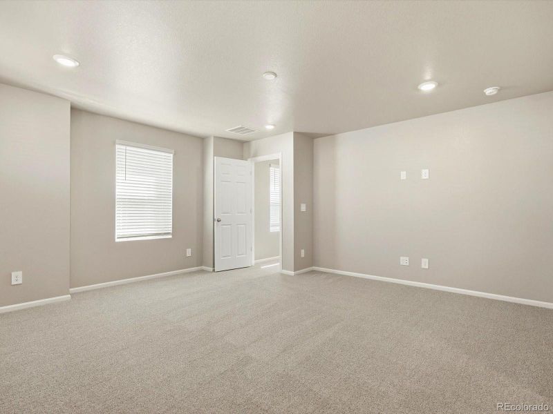Spacious, unfurnished interior of a new home in Buffalo Highlands: The Flora Collection, Commerce City (Image 22).