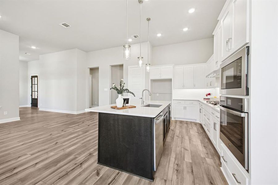 Furnished interior view inside a new home in Elements at Viridian - Garden Series, Arlington (Image 13). Furnished interior view inside a new home in Elements at Viridian - Garden Series, Arlington (Image 13).