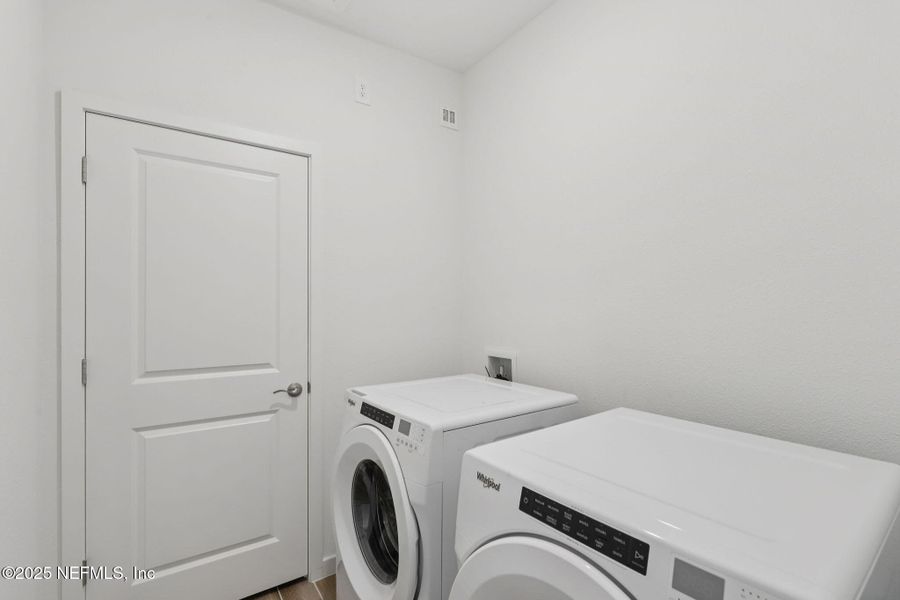 Furnished interior view inside a new home in Colbert Landings, Palm Coast (Image 9).
