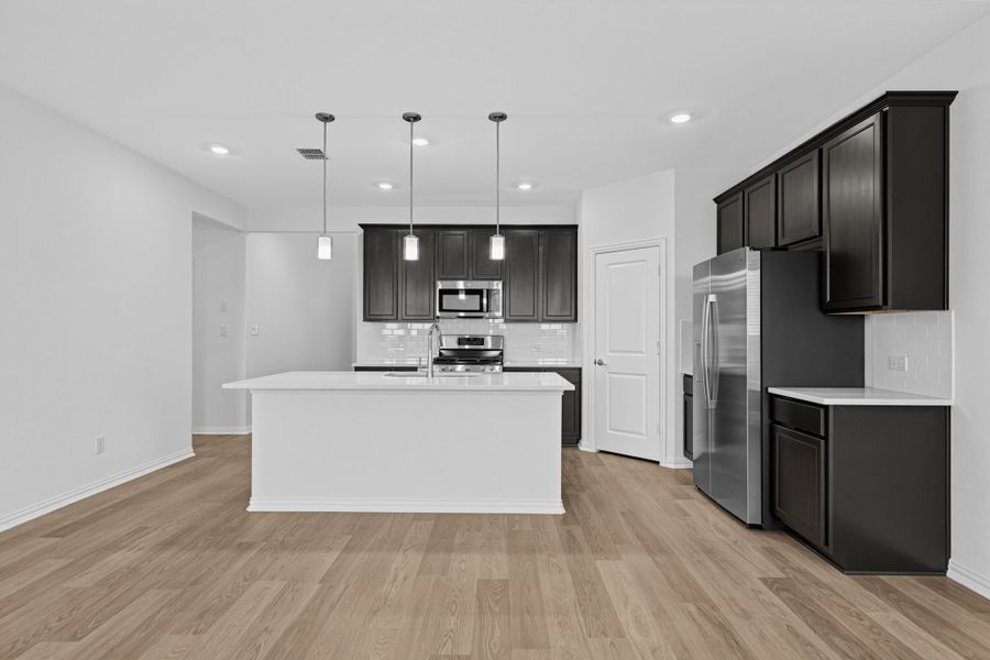 Furnished interior view inside a new home in Parks at Foster Crossing, Anna (Image 5).