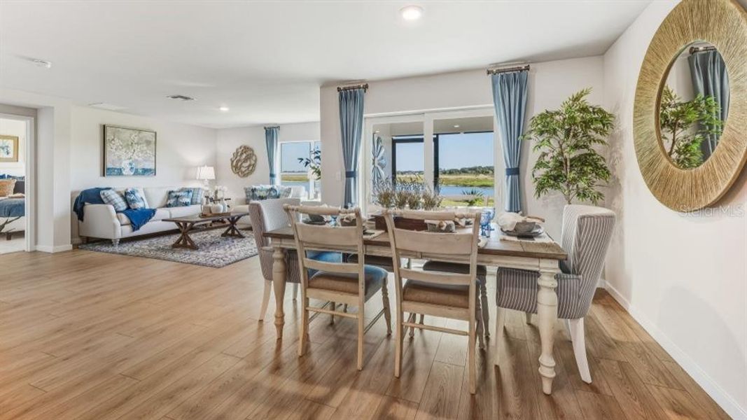 Furnished interior view inside a new home in Seagrass - Express & Tradition, Punta Gorda (Image 6). Furnished interior view inside a new home in Seagrass - Express & Tradition, Punta Gorda (Image 6).