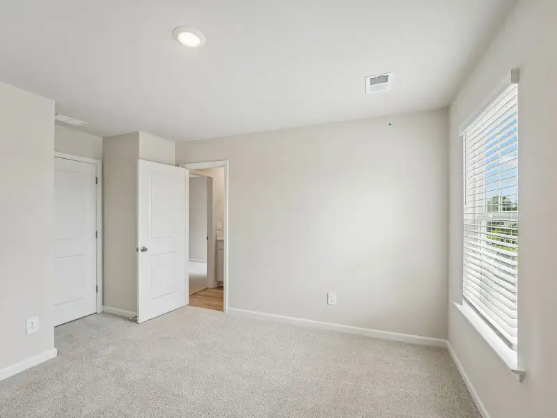 Spacious, unfurnished interior of a new home in Artisan Walk, Fairburn (Image 19).