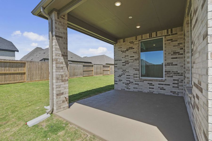 Exterior details and patio area of a home in Jordan Ranch 55's, Fulshear (Image 3).
