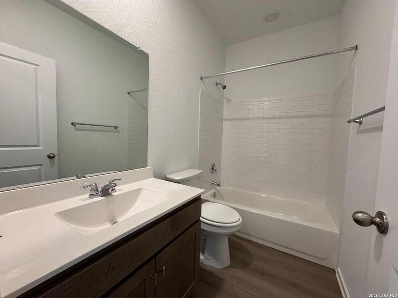 Furnished interior view inside a new home in Hennersby Hollow, San Antonio (Image 8).