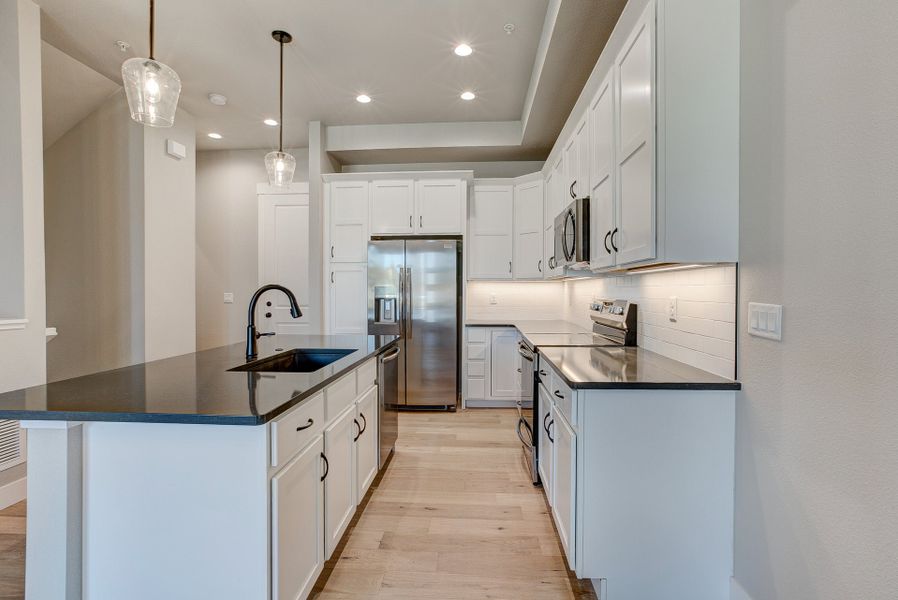 Representative furnished interior of a home built from the The Camden 2 by Landmark Homes in Highlands at Fox Hill, Longmont (Image 4).
