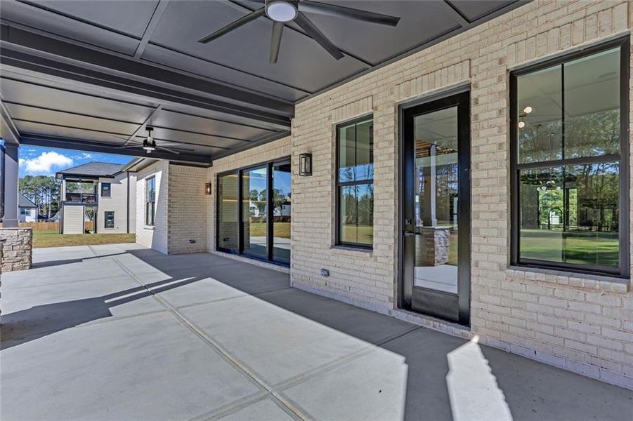 Exterior details and patio area of a home in , Loganville (Image 26).