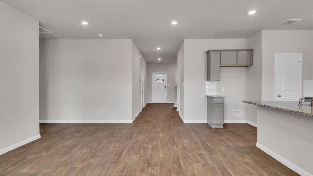 Spacious, unfurnished interior of a new home in Carillon, Manor (Image 14).