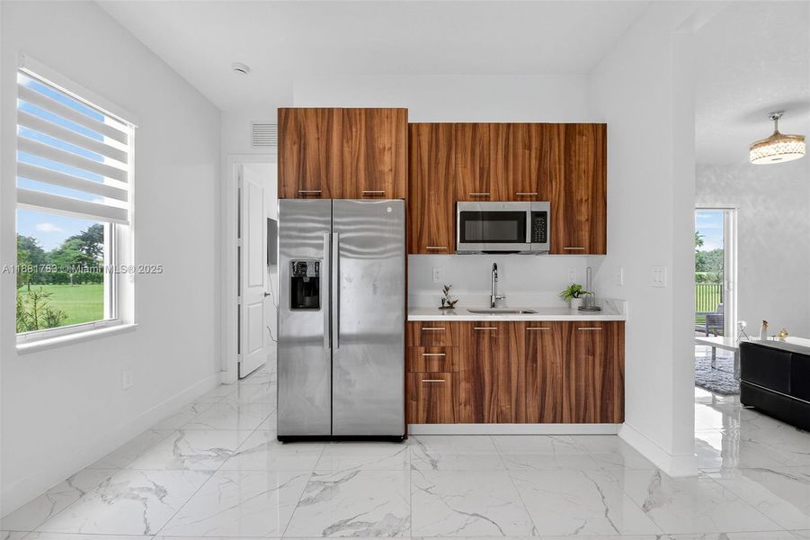 Furnished interior view inside a new home in Crescent Ridge, Davie (Image 7).