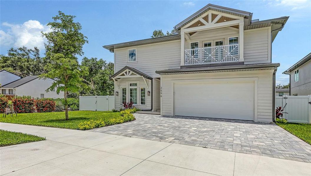 Front exterior of a new home in , Sarasota, FL, highlighting curb appeal (Image 19).