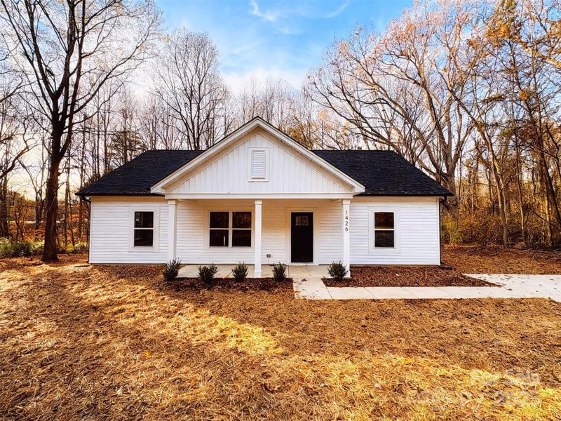 Front exterior of a new home in , Statesville, NC, highlighting curb appeal (Image 1). Front exterior of a new home in , Statesville, NC, highlighting curb appeal (Image 1).